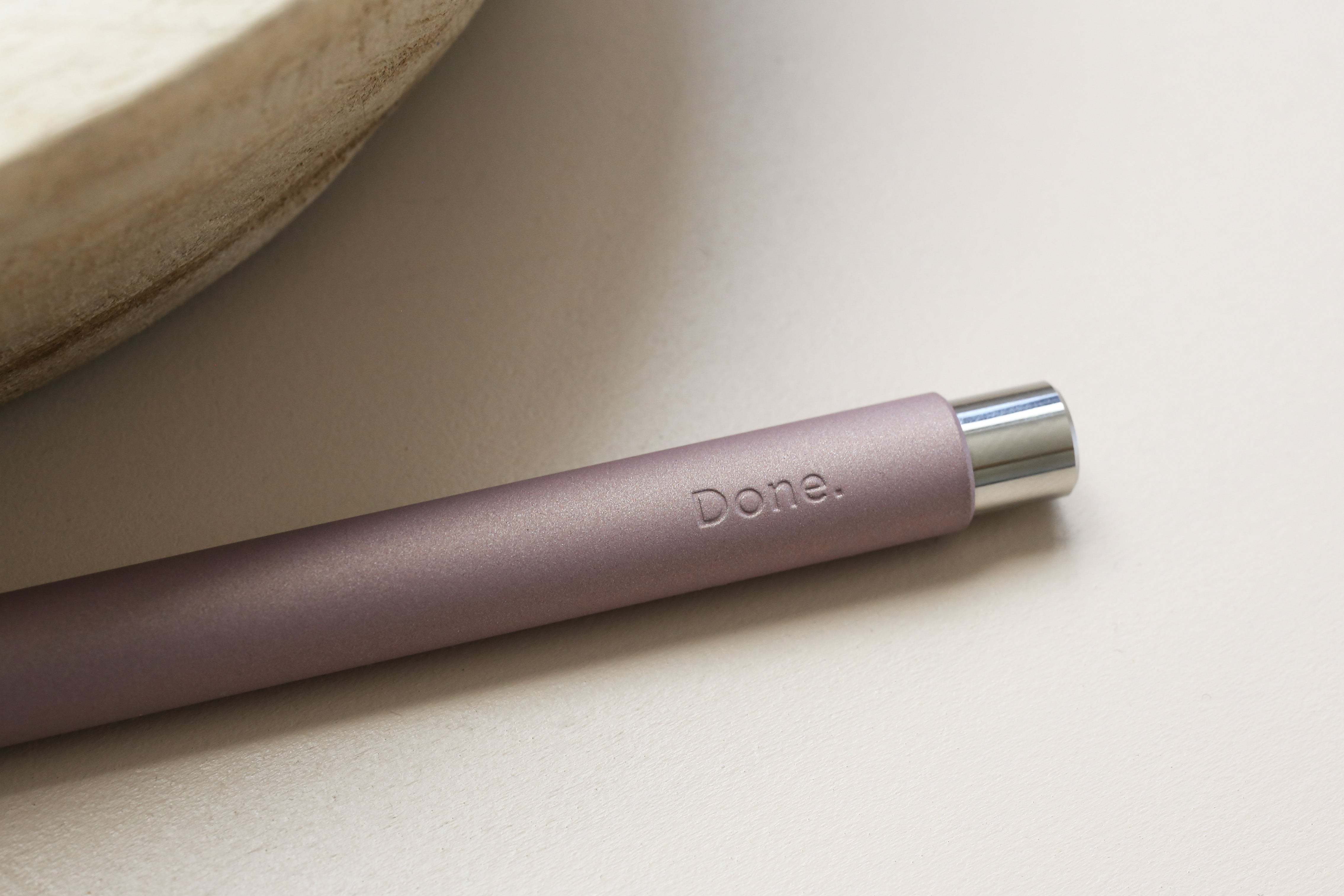 A pink mark one with a logo engraved.